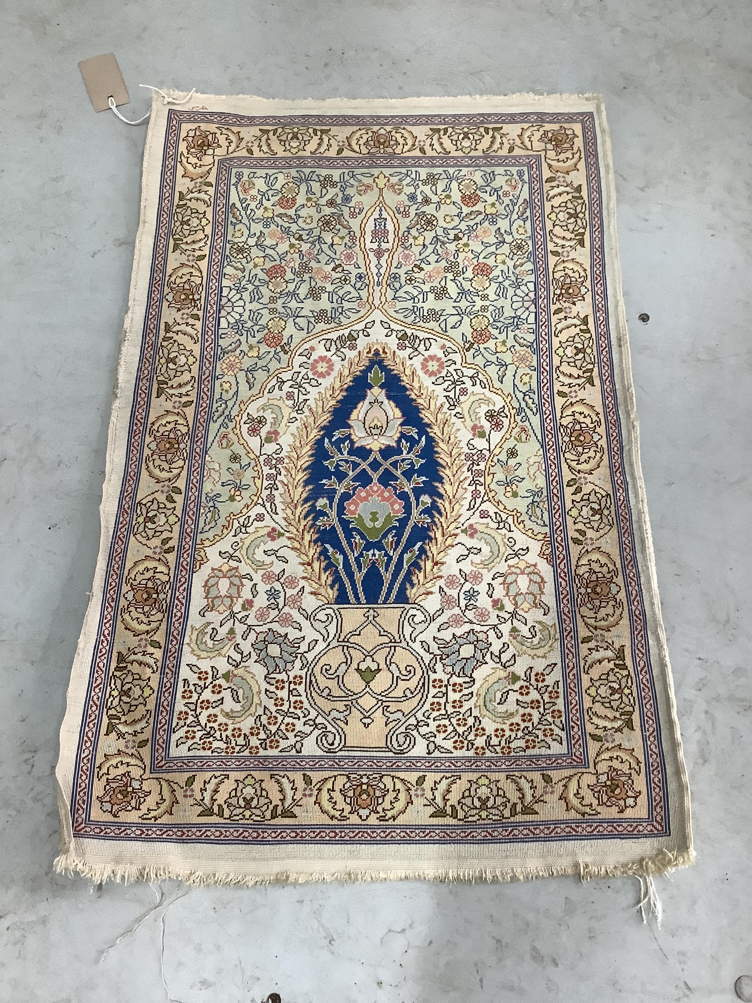 A North West Persian ivory ground silk prayer mat, 66 x 44cm